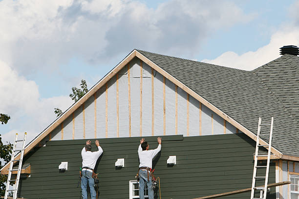 Professional Storm Damage Siding Repair technician working in Richardson, TX